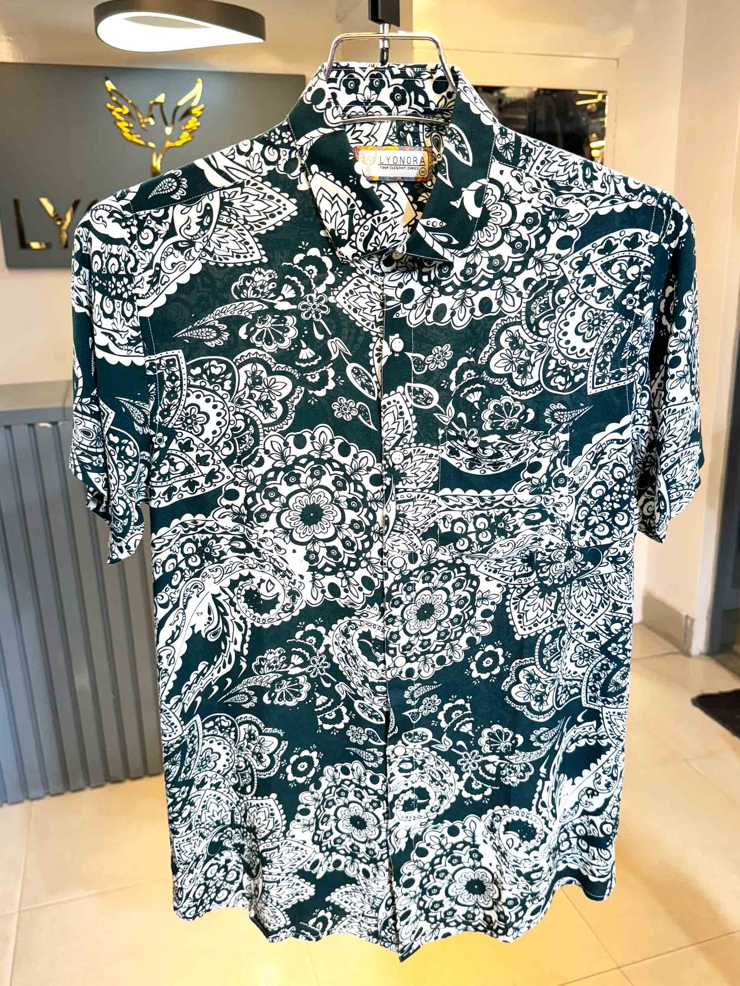 Green paisley printed half sleeve shirt